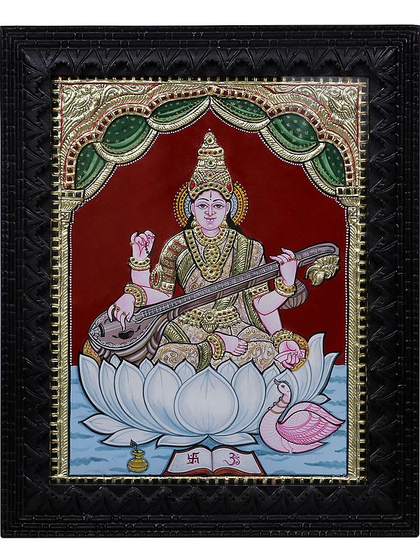 Tanjore Painting of Goddess Saraswati Seated on Lotus | Traditional Colors with 24 Karat Gold | With Frame
