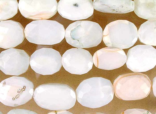 Fleshy Opal Faceted Ovals