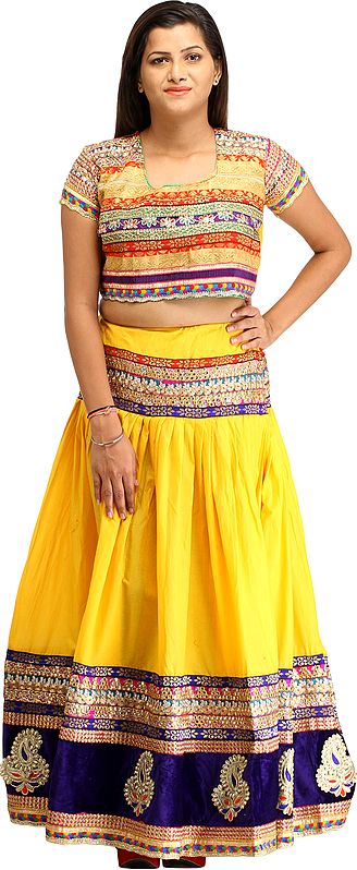 Spectrum-Yellow Two-Piece Lehenga Choli with Zari-Embroidery and Paisley Patches on Border