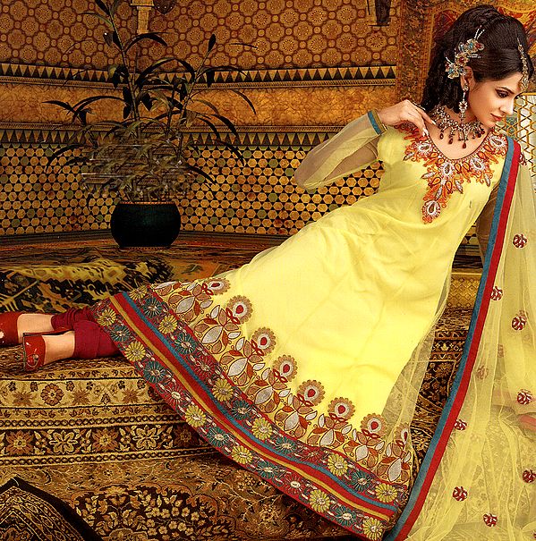 Pale-Yellow Designer Choodidaar Flaired Suit with Metallic Thread Embroidered Flowers and Patch Border