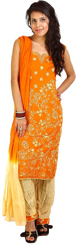Russet-Orange Salwar Suit with All-Over Embroidery and Sequins