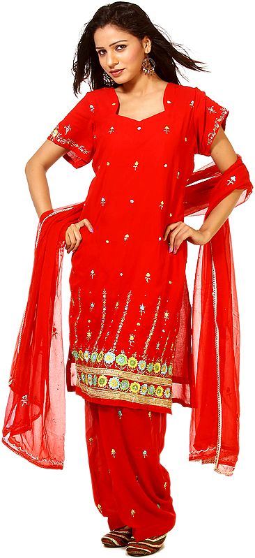 Tomato-Red Salwar Kameez with All-Over Embroidery and Floral Border