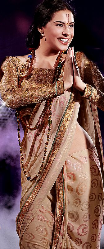 Cream Designer Sari with Printed Ovals and Patch Border