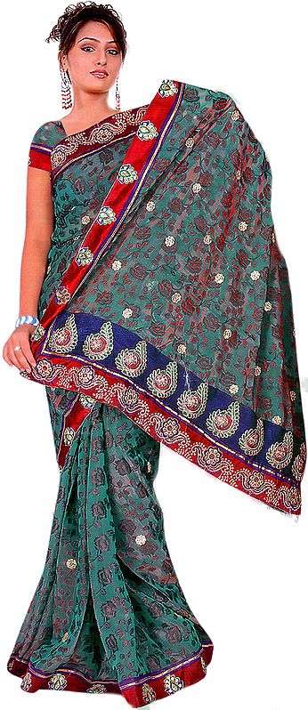 Deep-Sea Green Sari with Self Weave Of Flowers and Sequinned Border