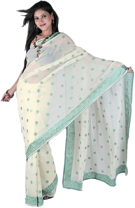 Cream Designer Sari with All-Over Embroidered Flowers in Green Thread