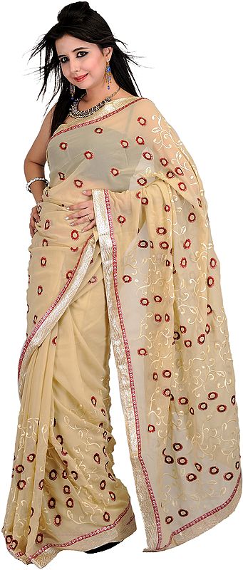 Beige Designer Sari with Metallic Thread Embroidered Flowers and Patch Border