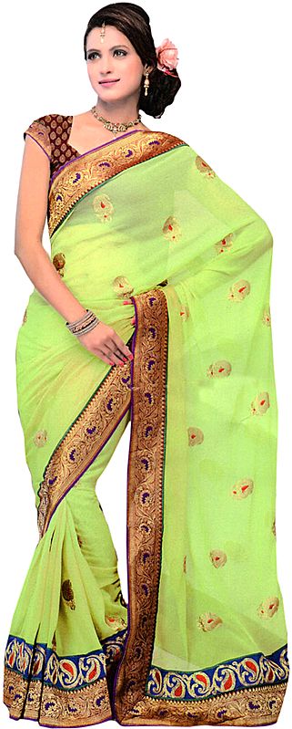 Foliage-Green Designer Wedding Sari with Metallic Thread Embroidered Booties and Patch Border