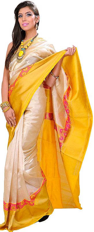 Ivory-Cream Plain Banarasi Tissue Sari With Woven Flowers and Wide Yellow Border