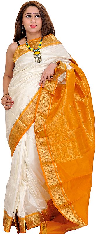 Ivory and Amber Sari from Bangalore with Woven Bootis and Brocaded Aanchal