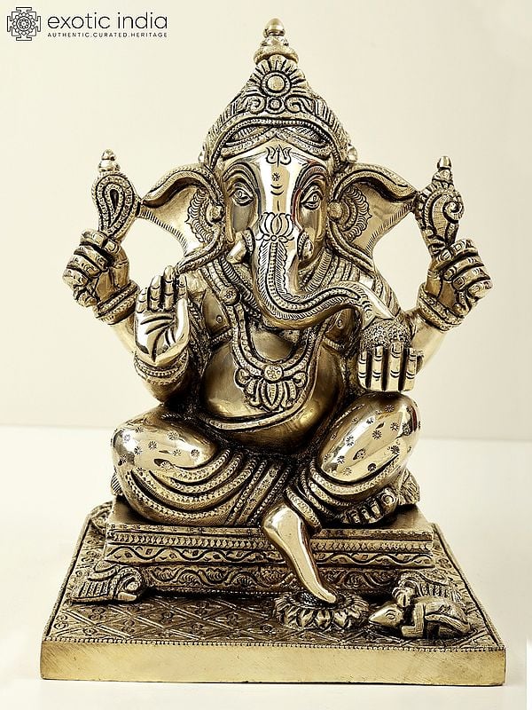 9" Lord Ganesha Seated on Pedestal and Eating Modak | Brass Bhagawan Ganesha | Brass Statue | Handmade | Made In India