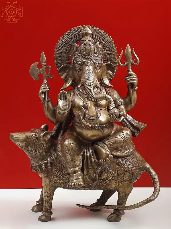23" Ganesha Seated on His Rat Wearing a Leafy Crown In Brass