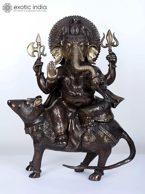 23" Ganesha Seated on His Rat Wearing a Leafy Crown In Brass