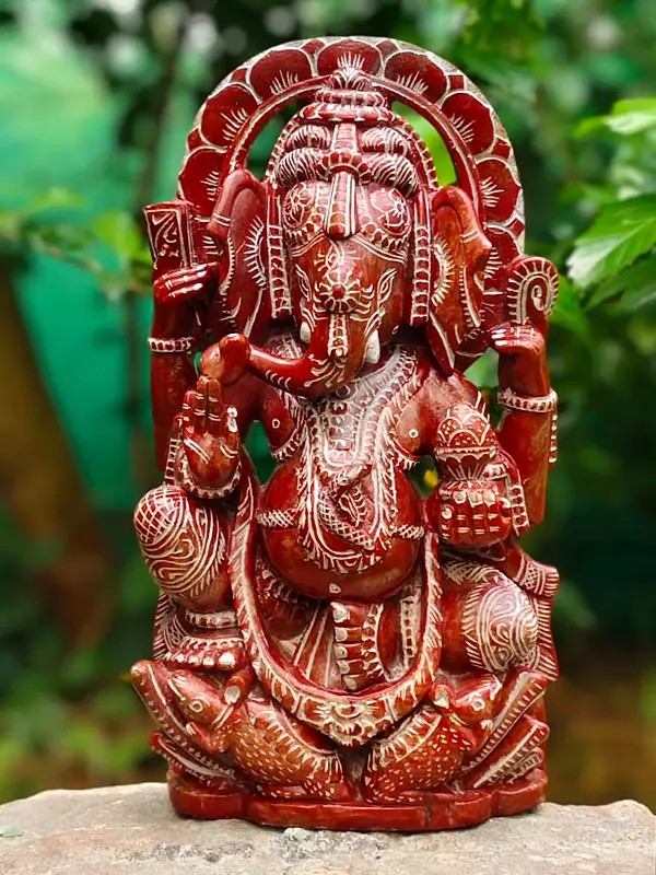 Lord Ganesha Holding A Modak | Red Stone Statue | Handmade Idol