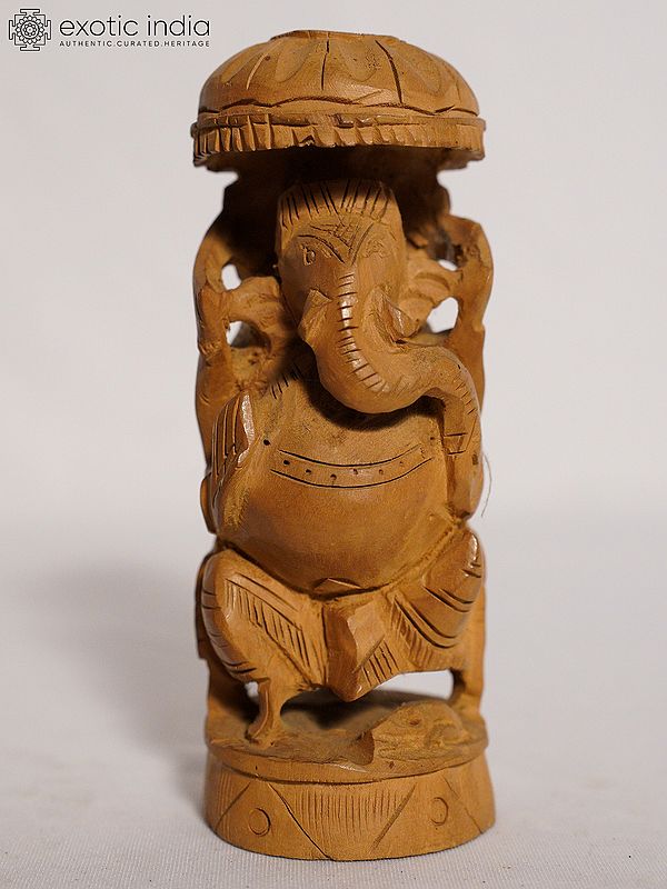 6" Ganesha Seated On A Throne With An Umbrella | Handmade Rosewood Figurine