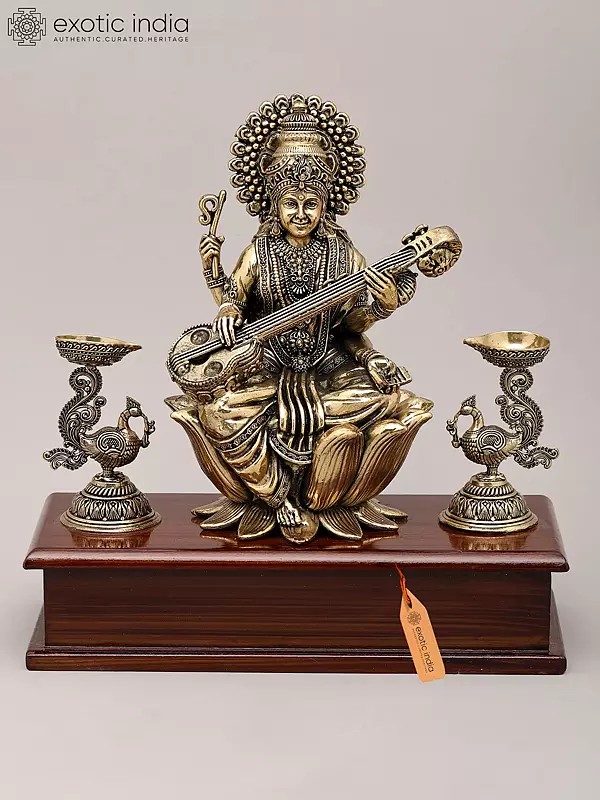 9" Superfine Goddess Saraswati Playing Sitar with Peacock Oil Lamp on Wood Base | Brass Statue