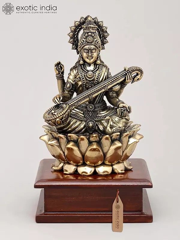 7" Superfine Chaturbhuja Goddess Saraswati Seated on Lotus with Wood Base | Brass Sculpture