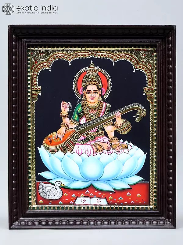 Goddess Saraswati Seated on Lotus with Sitar | Handmade Tanjore Painting | Traditional Colors with 24 Karat Gold | With Frame