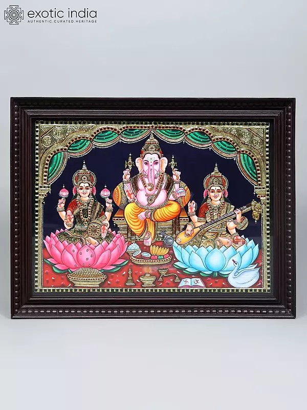 Seated Goddess Lakshmi, Lord Ganesha and Goddess Saraswati | Traditional Colors with 24 Karat Gold | Tanjore Painting with Frame