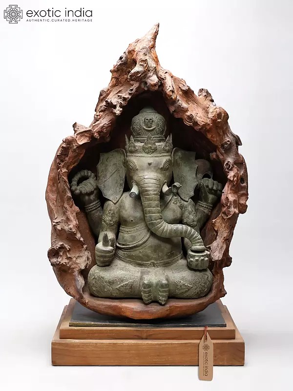 33" Four Armed Lord Ganesha Seated in Wood Cave