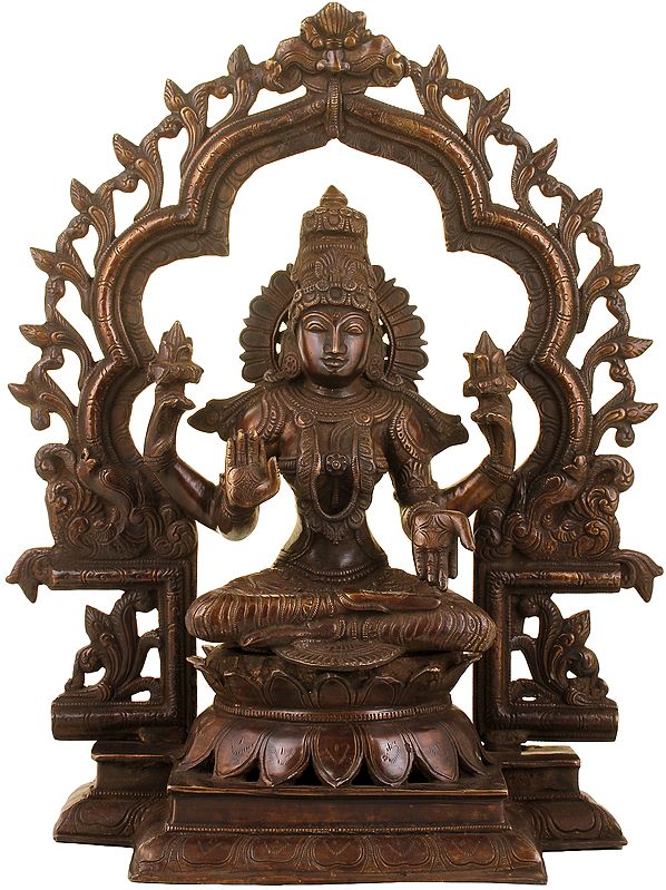 15" Lakshmi Against An Elaborate Aureole In Brass | Handmade | Made In India