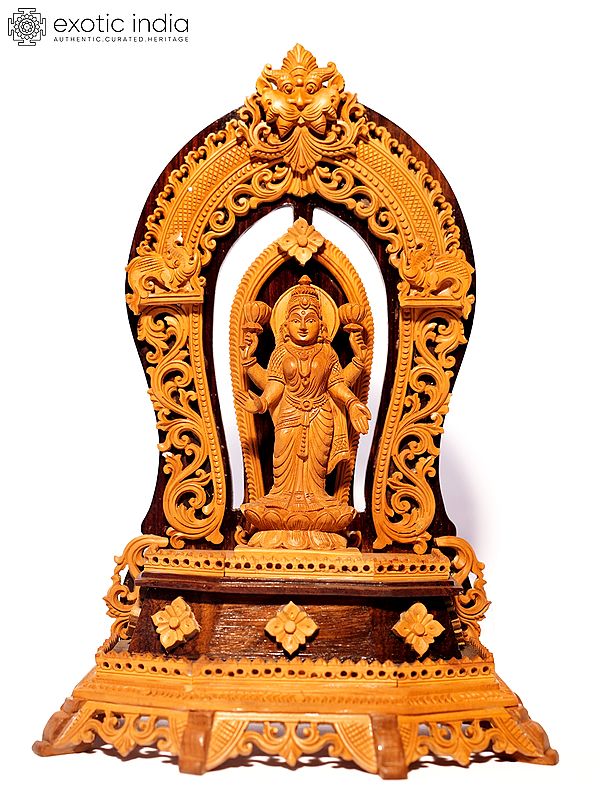 10" Standing Goddess Lakshmi on Kirtimukha Throne | Sandalwood Carved Statue