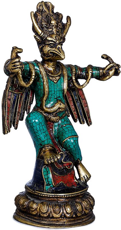 Garuda Holding Serpents In Both Hands