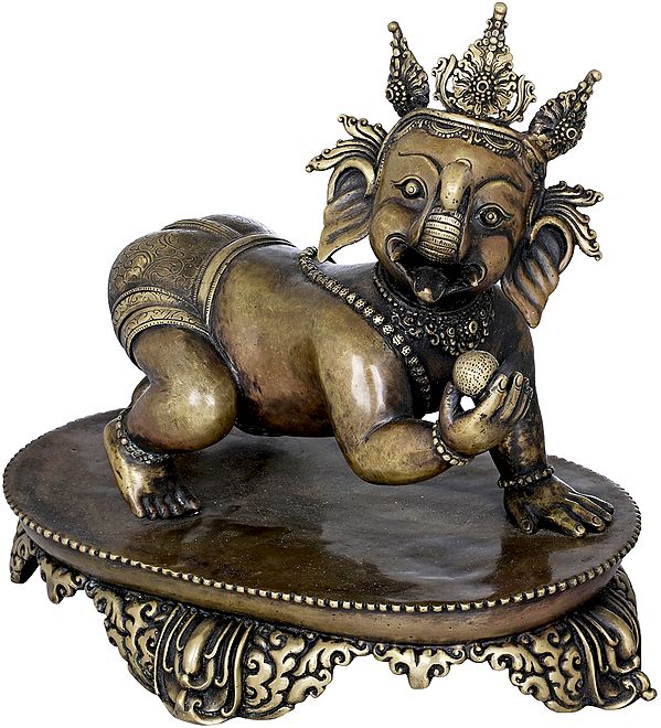 Crawling Baby Ganesha with a Modak in Hand