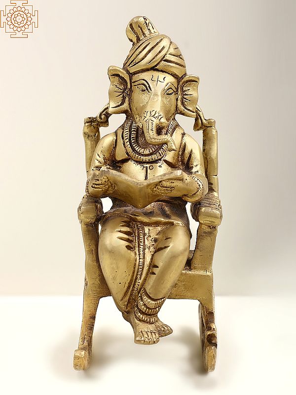 7" Lord Ganesha Reading Book on Rocking Chair In Brass