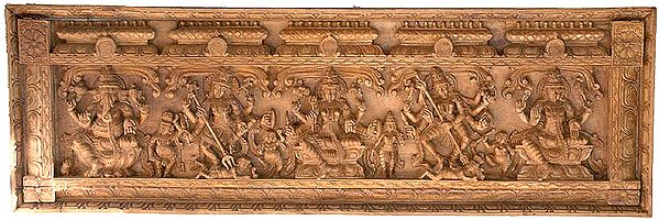 A Rare Shaivite Wooden Temple Panel (From the Left - Shri Ganesha, Shiva Destroying Andhakasura, Seated Parvati, Durga Destroying Mahishasur and Seated Shiva with Ganas and Attendants)