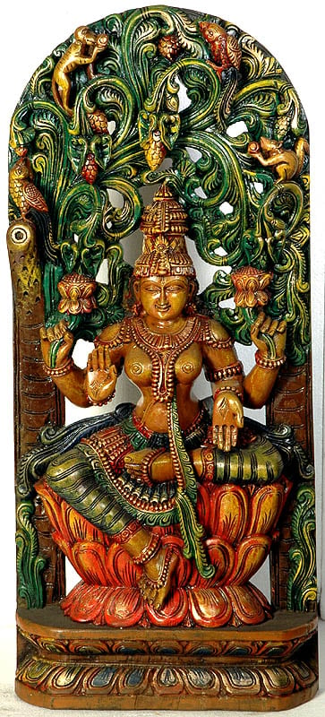 Goddess Lakshmi Seated Against Brilliantly Carved Aureole