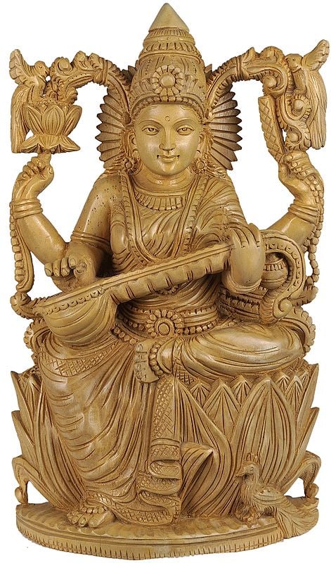 Four Armed Goddess Saraswati Seated on Lotus Wearing Sari