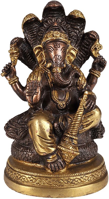 Four-Armed Ganesha Seated on Five-hooded Serpent