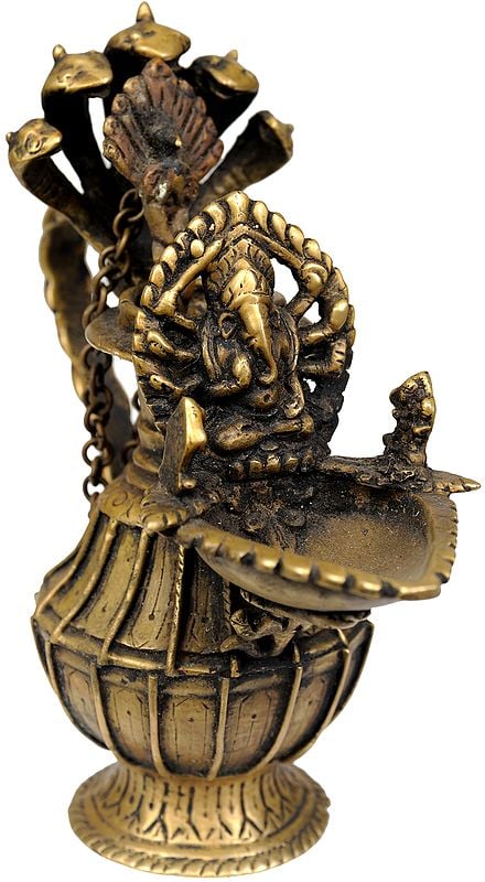 Lord Ganesha Lamp with Five-Hooded Serpent Handle, Oil Bowl and Peacock Spoon