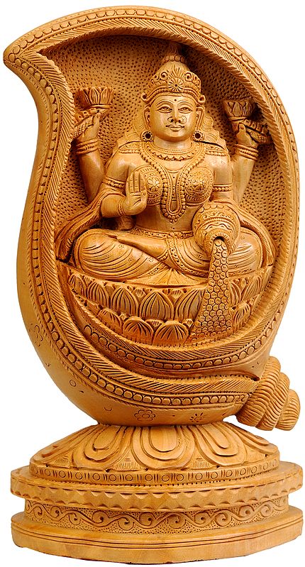 Devi Lakshmi Seated in Conch with Pot of Coins