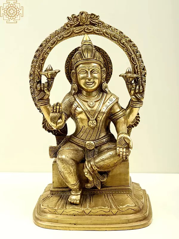 10" Goddess Lakshmi Seated on Pedestal In Brass