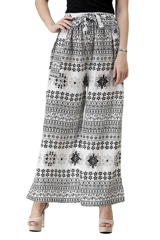 Black and White Palazzo Trousers with Printed Flowers and Side Pockets