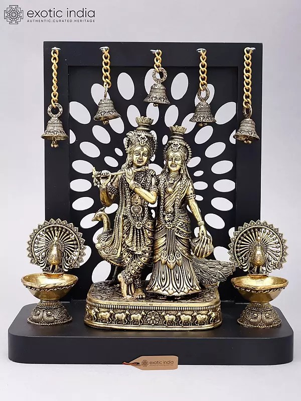 12" Superfine Divine Pair of Radha Krishna with Peacock Lamps and Bells | Brass Statue with Designer Wood Frame