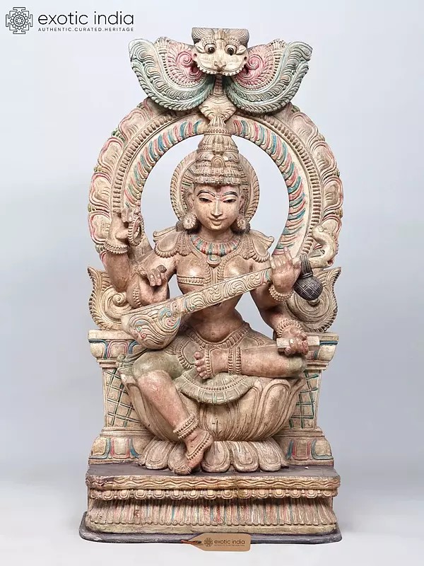 Large Four Armed Goddess Saraswati Seated on Kirtimukha Throne | Wood Carved Statue