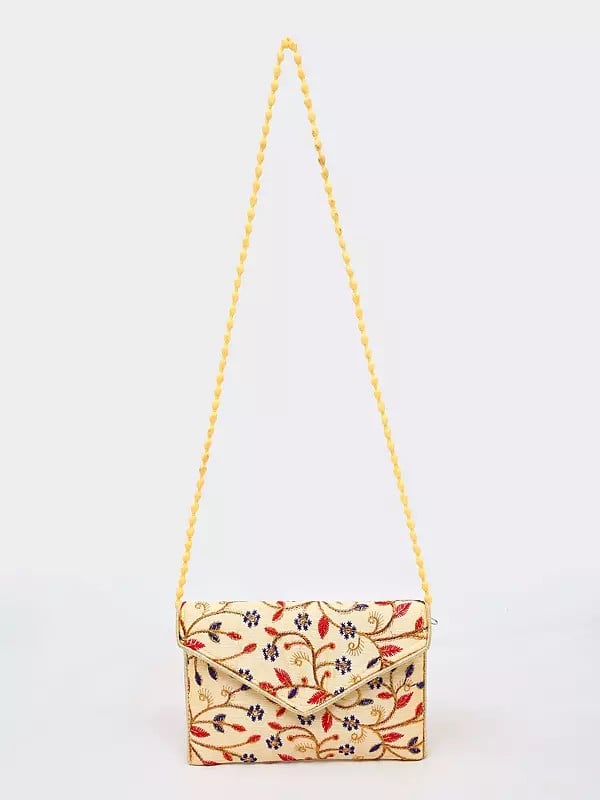 Almond-Oil Floral Embroidered Clutch Sling Bag with Damru Dori