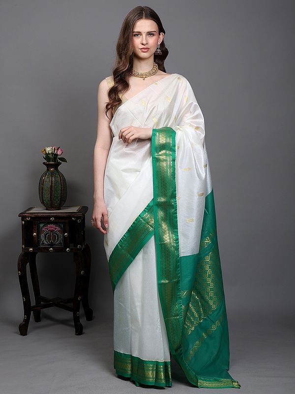 Snow-White Temple Saree with Zari Woven Motifs and Contrast Pallu-Border from Kumbakonam