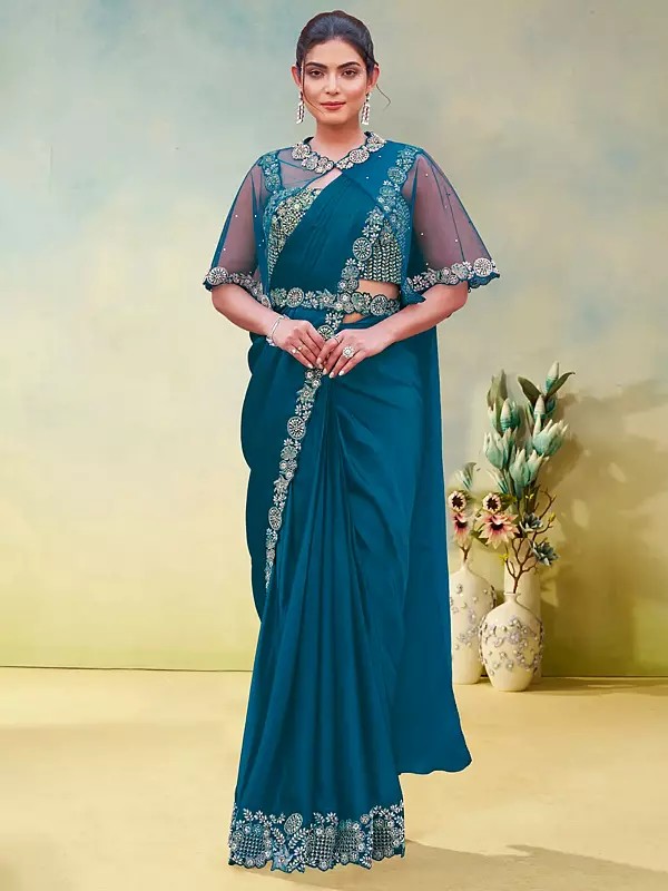 Graceful Crepe Satin Silk Saree Enhanced With Dual Sequence Embellishments And Fine Hand Work For Bridal Wedding