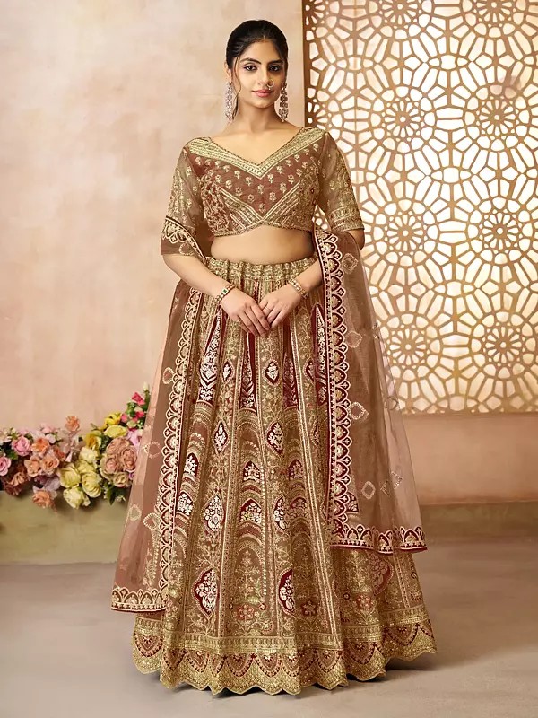 Banarasi Silk Floral Ari Embroidery And Sequins Work Lehenga Choli With Net Dupatta For Wedding Occasion