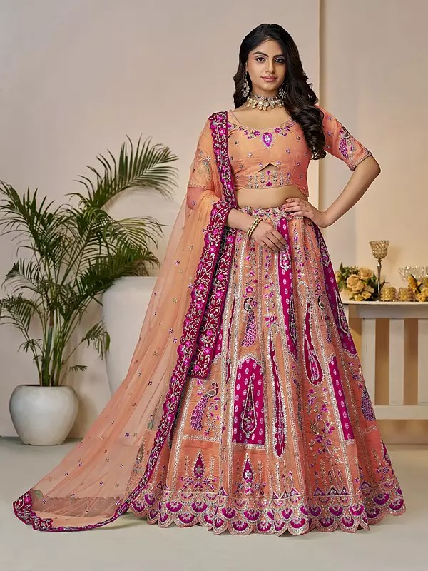 Banarasi Silk Peacock Motifs Embroidery And Sequins Work Elegant Lehenga Choli With Soft Net Dupatta