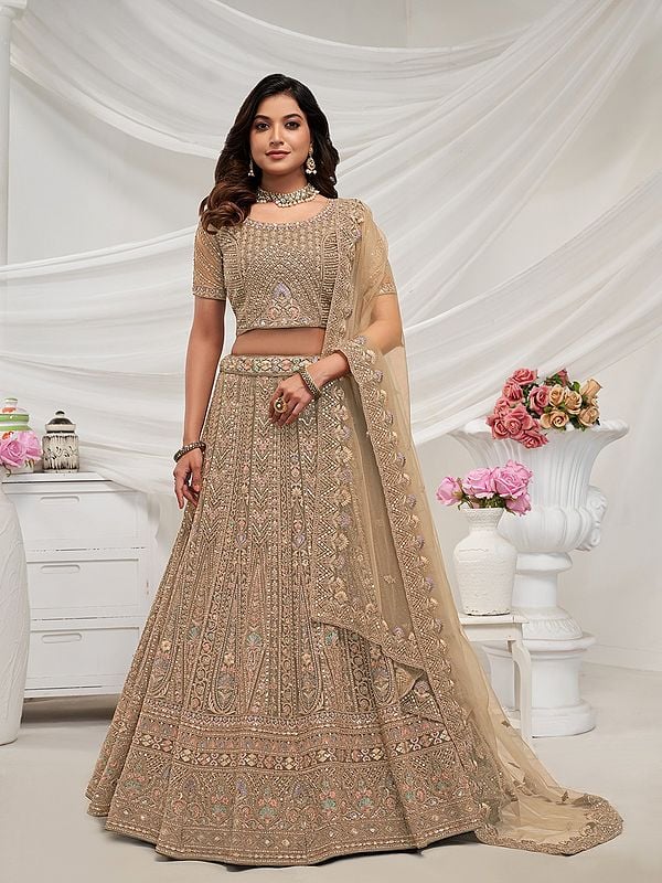 Golden Paisley Pattern Intricate Sequin And Zari Work Bridal Lehenga Choli With Soft Net Dupatta For Wedding Occasion