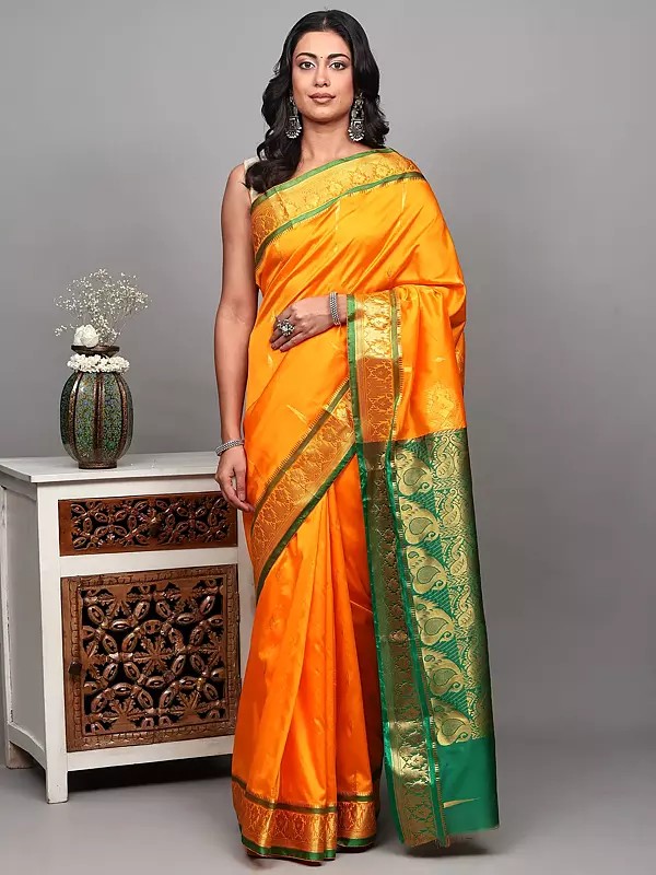 Blazing-Orange Temple Border Banarasi Saree with Zari woven Bootis and Paisley Pallu