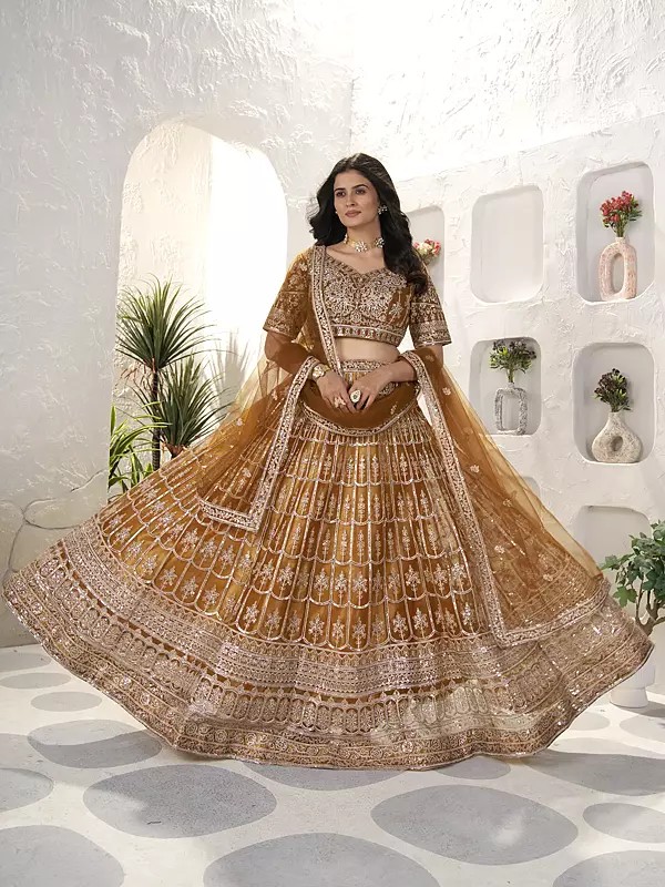 Embroidery And Sequins Work Elegant Wedding Wear Net Lehenga Choli