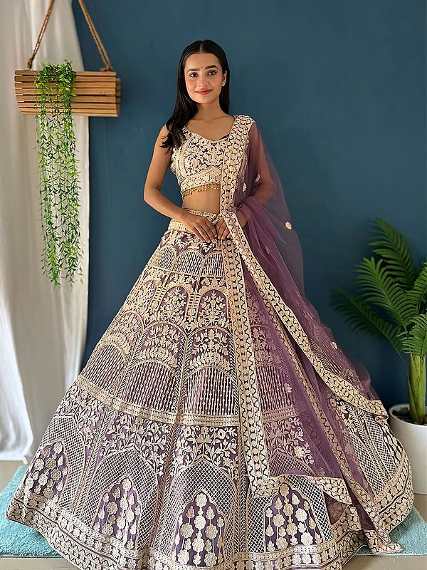 Heavy Embroidery Work Attractive Net Lehenga Choli With Dupatta For Wedding Occasion
