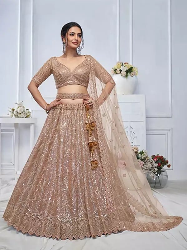 Soft Net Sequins Work Wedding Wear Embellished Lehenga Choli With Dori Tassels And Matching Dupatta