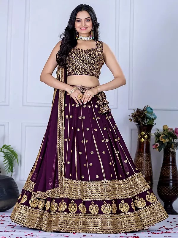 Stunning Wine Faux Georgette Lehenga Choli Set With Rich Golden Detailing Ideal For Brides And Parties