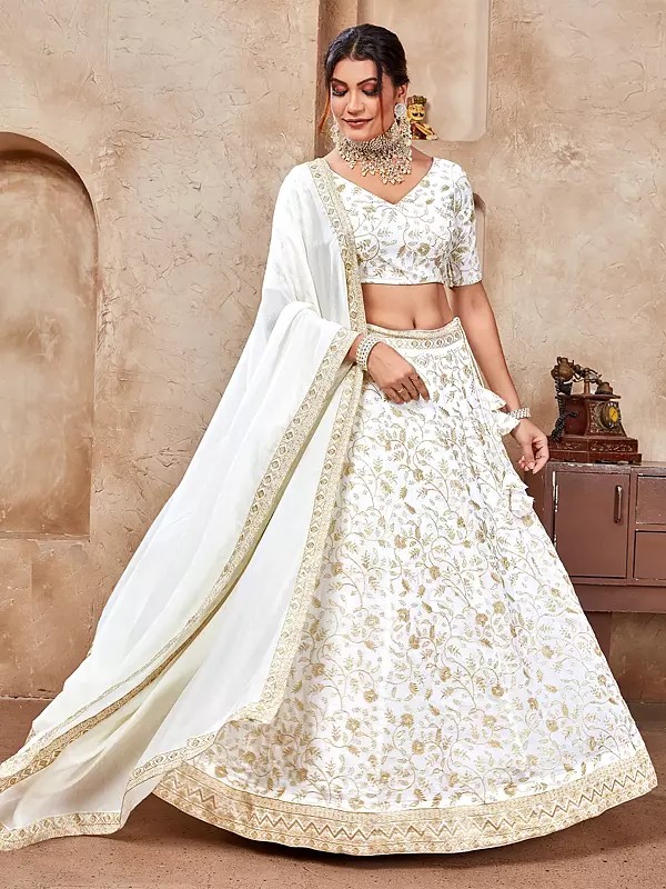 Elegant White Vichitra Lehenga Choli With Intricate Thread And Sequin Embroidery